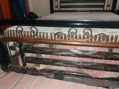 Metal bed with Medicated mattress only in. . . . . .