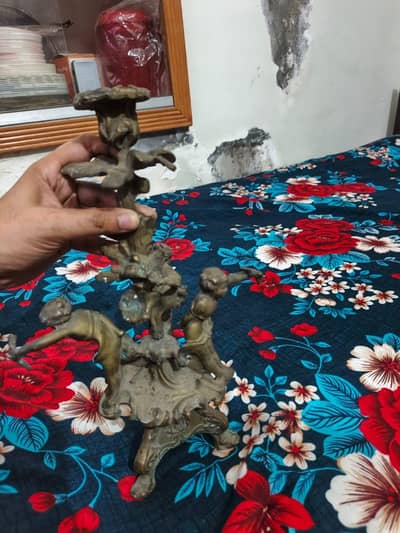 Antique figural bronze or brass candlestick holder