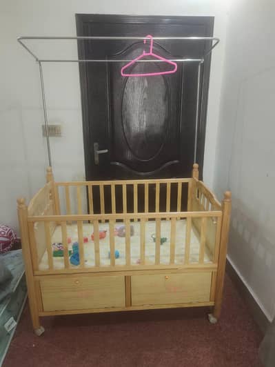 Wooden cot slightly used for sale
