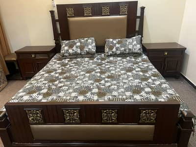 Bed with side tables and dresser