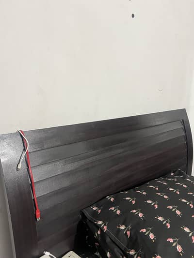 Wooden single bed