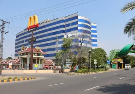 8 KANAL COMMERCIAL PROPERTY LOCATED AT PRIME LOCATION FACING MAIN BOULEVARD GULBERG AT A PRICE OF 28 CRORE PER KANAL.