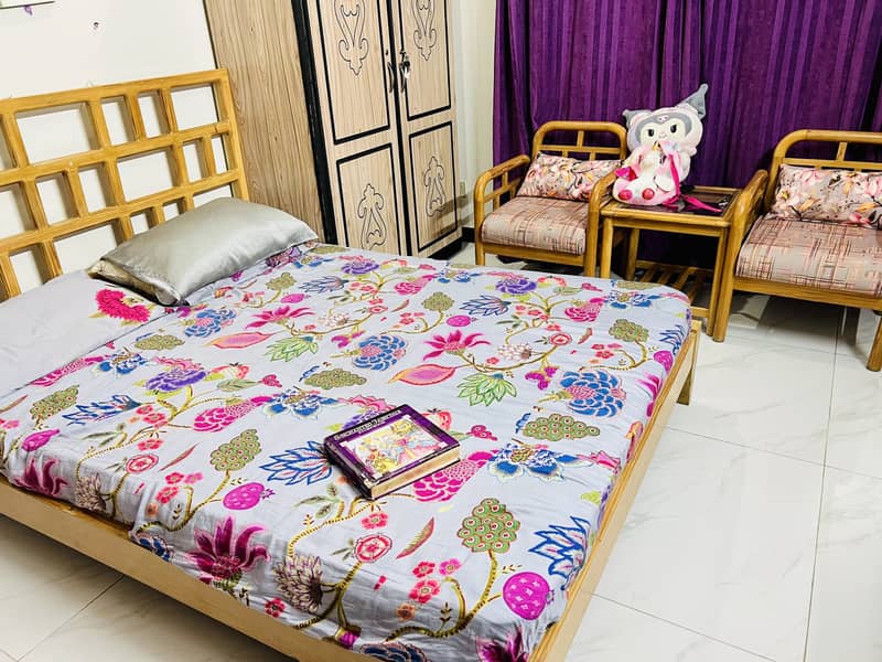 Chen one solid wood bed with solid chairs and table . Excellent condit 1