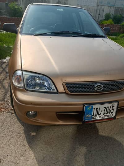 Suzuki Cultus 2002 Golden Alloy Rims Mehran Carborator