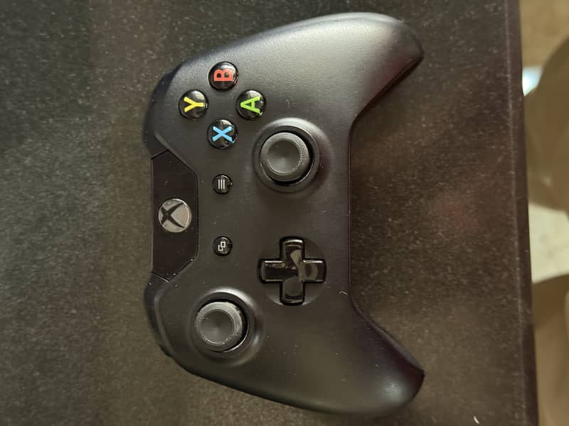 X box one s with two controllers 6