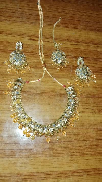 Artificial jewelry gold water cover up