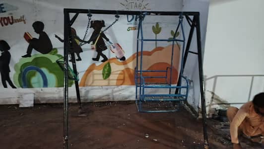 Swings- Thick iron made old