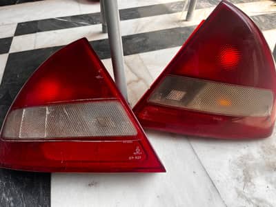 Mitsubishi Lancer 1997-98 Head & Tail Lights