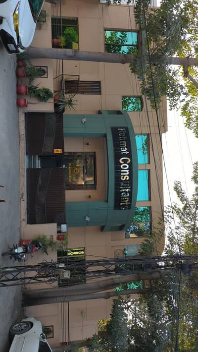 faisal Town corner building availability for rent