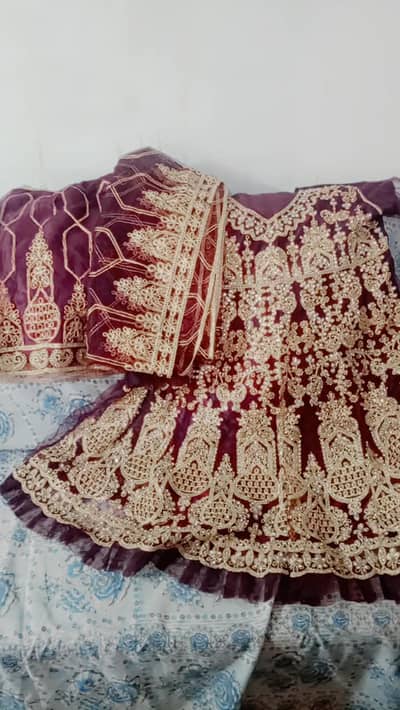 Beautiful purple embroidered party Wear ladies dress