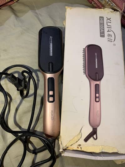 Hair straightening brush Excellent condition box damage Working 100%