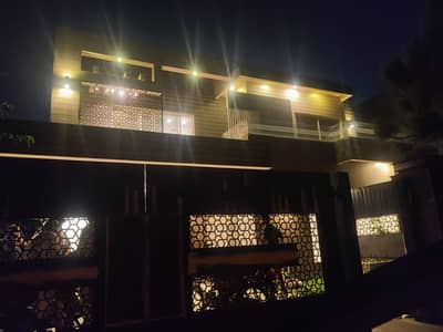 SYED BROTHERS PROUDLY OFFERS: 1-Kanal Elegant And Fully Maintained Double Unit Bungalow With Easy Access to Dolmen & Ring Road Is Available In The Best Block Of DHA Lahore.