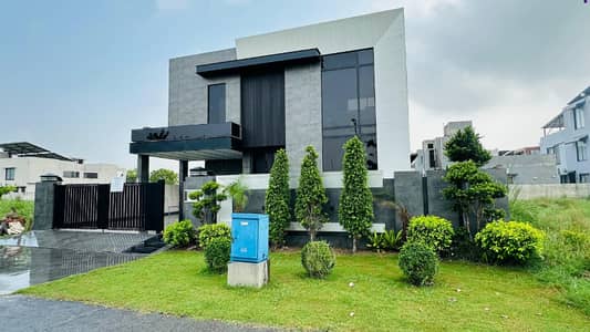 SYED BROTHERS PROUDLY OFFERS: 1-Kanal Elegant And Modern Bungalow Near Macdonald Is Available In The Best Block Of DHA Lahore.