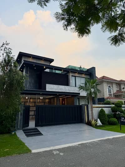 SYED BROTHERS PROUDLY OFFERS: 1-Kanal Elegant And Fully Furnished Bungalow With Basement, Solar, Theater, Roof Top & Gym Is Available In The Best Block Of DHA Lahore.