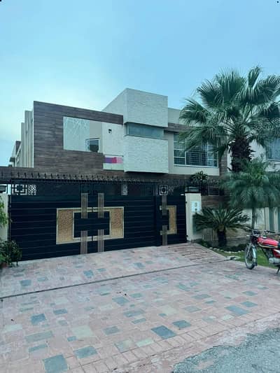 SYED BROTHERS PROUDLY OFFERS: 1-Kanal Elegant And Slightly Used Furnished Bungalow With Lift Installed Is Available In The Best Block Of DHA Lahore | Prime Location
