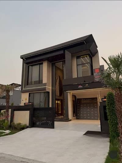 SYED BROTHERS PROUDLY OFFERS: 1-Kanal Elegant And Fully Furnished Bungalow With Mini Swimming Pool Is Available In The Best Block Of DHA Lahore.
