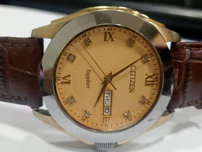 Citizen watch day and date sapphire glass with brown leather strap