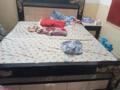 King size bad with metres  and side tables
