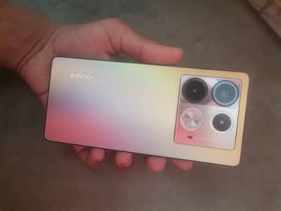 Infinix Note 40 with box +original 45w charger +wireless charger