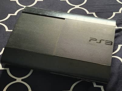 Sony PlayStation 3 (PS3) Super Slim + 35 Hit Games Collection!