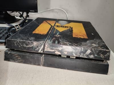 PS4 with 5 game discs