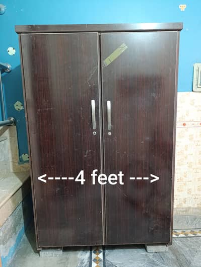 2 door wooden wardrobe . very heavy for sale