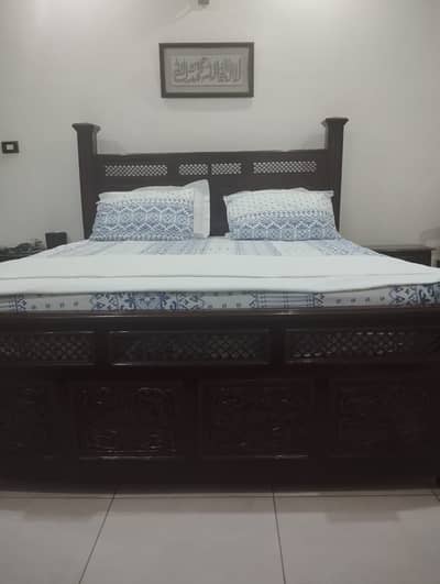 Bed, Side Tables, and Dressing Table made of pure sheesham wood.