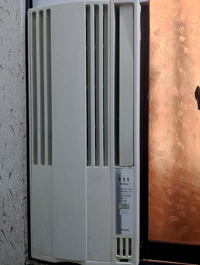 110 volt 3/4 ton window a. c good condition with 220 converter