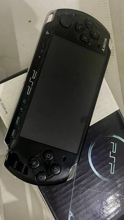 PSP 3000 with  128GB cards & original box & charger