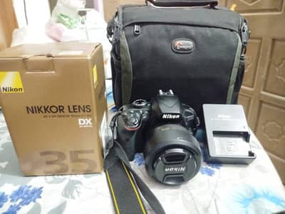 Nikon D3400 with 35mm f/1.8G lens Perfect Condition
