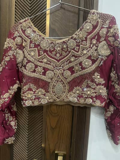Weeding Dress|Bridal Dress|designer maroon red lehenga by Ahmed Sulta
