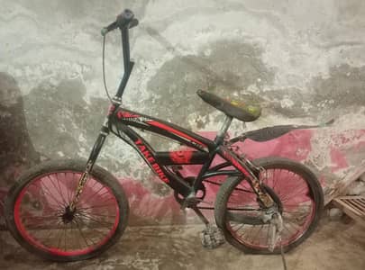 Red colour Cycle for sale in Lahore for 7 to 12 years old kids