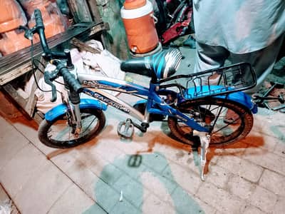 BLUE CYCLE FOR 7 TO 10 YEARS CHILDREN IN 10 X 10 CONDITION
