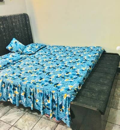 bed two side tables and two sofa and one little table gift
