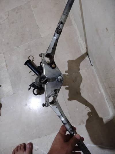 Handle aur T Ravi  piago. Suzuki 150
