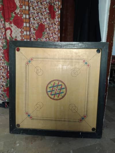 Carrom board for sell new condition with all coins and strikers