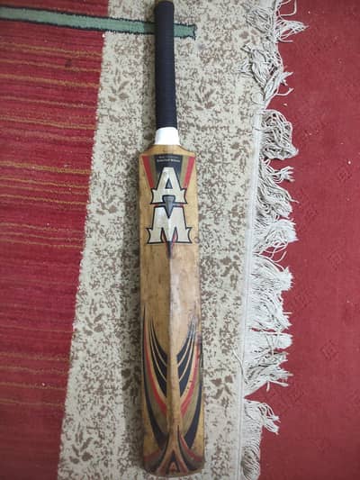AM hard cricket bat