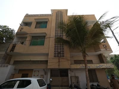 200 Square Yards Corner Commercial Building With Attractive Rental Income In P & T Housing Society Is Available For Sale