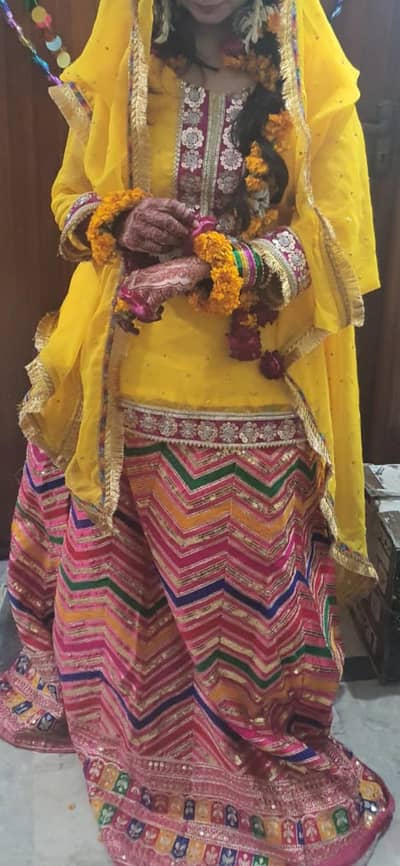 multi coloured bridal lahenga for mahendi or mayoun