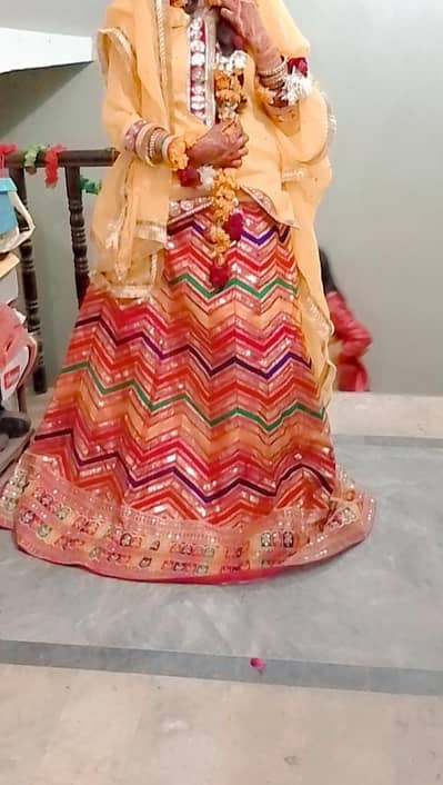 multi coloured bridal lahenga for mahendi or mayoun
