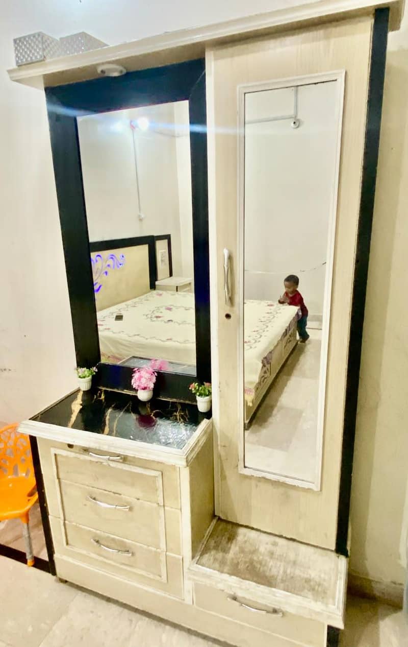 bed and dressing table 0