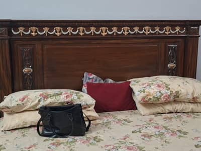 bed with 4 door cupboard
