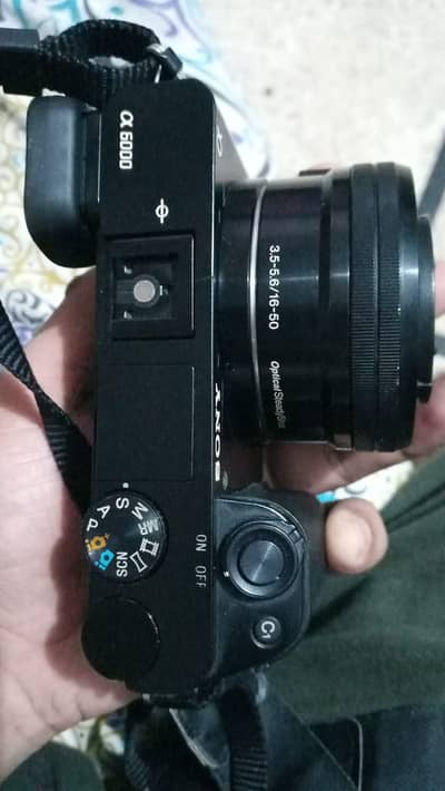 Sony A6000 Mirrorless Camera Bundle (2 Batteries, 128GB Card, Bag