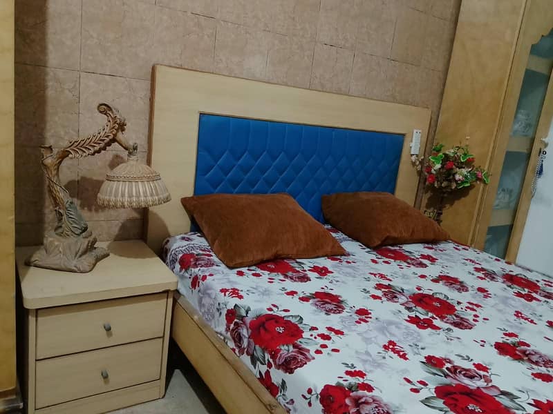 bed with side table 3