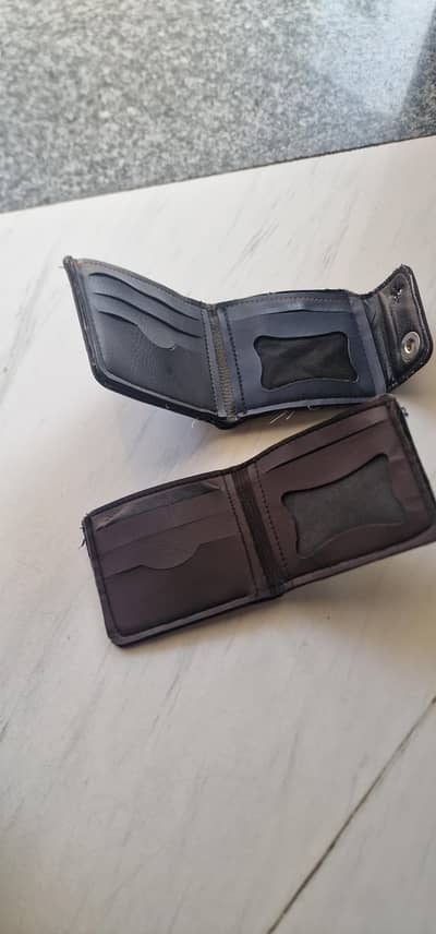 one used wallet one new wallet