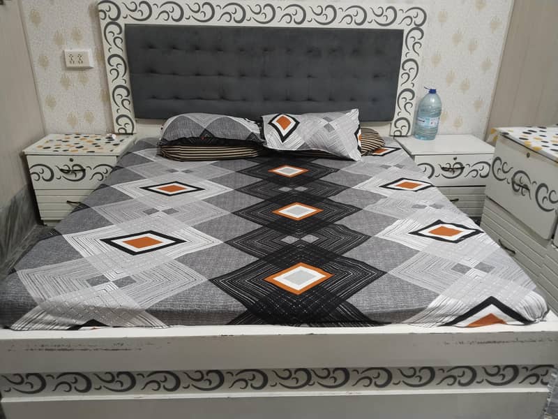 bed with side table and dressing table 0