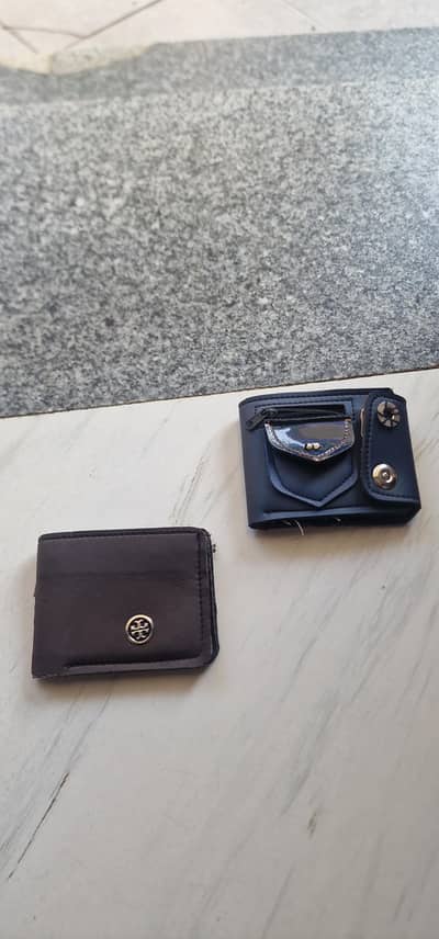 one used wallet one new wallet