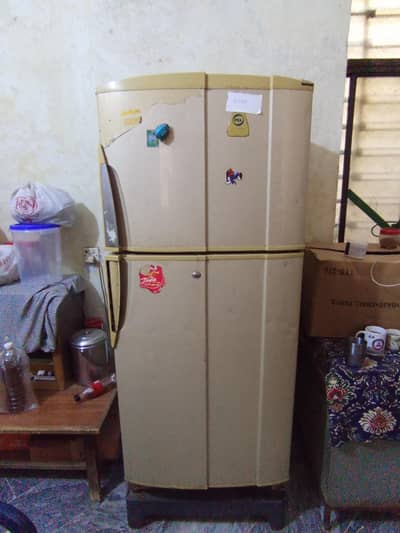 old full size refrigerator
