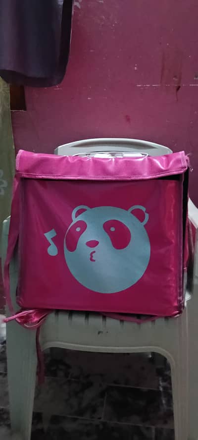 new foodpanda bag and shirt availabe for. sell