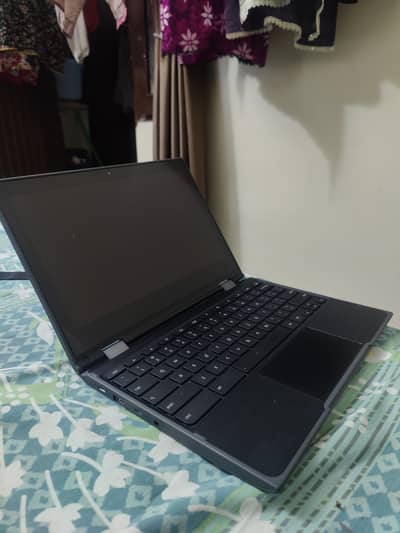 Lenovo Chromebook 300e with charger and laptop bag